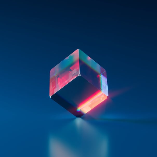 an image of a cube made of shiny glass.